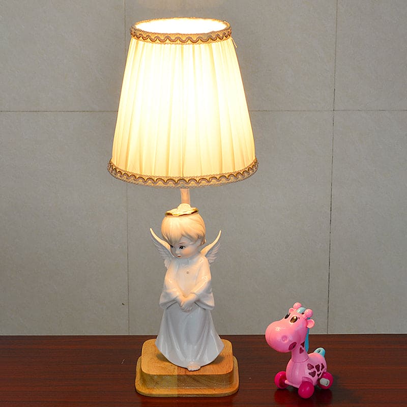 Elegancka lampka nocna anioł