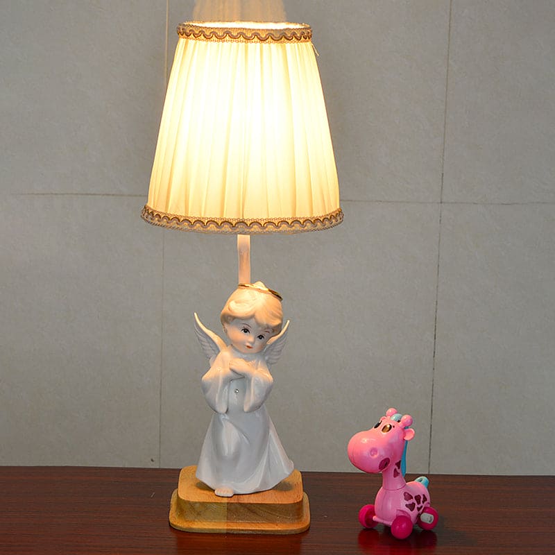 Elegancka lampka nocna anioł
