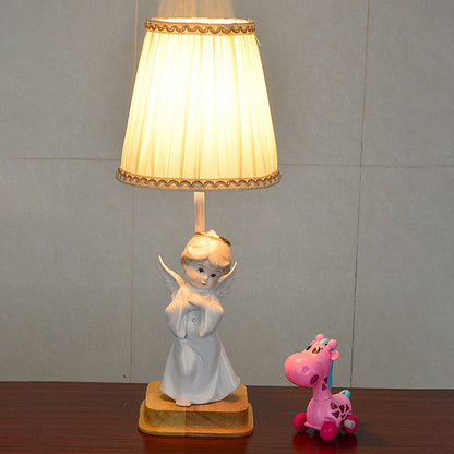 Elegancka lampka nocna anioł